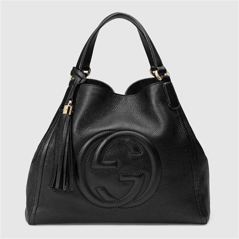 gucci kara|Gucci leather shoulder bag.